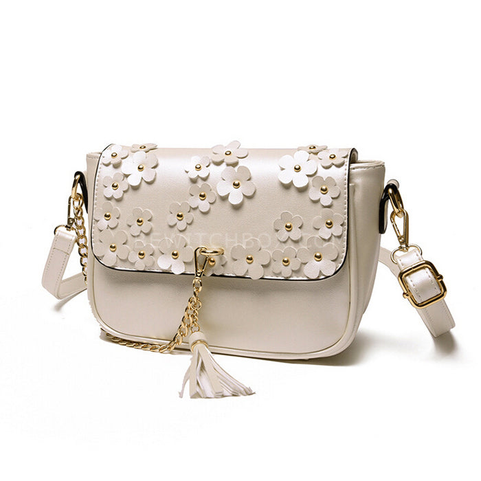 Flap shoulder bag with plum flower ornaments