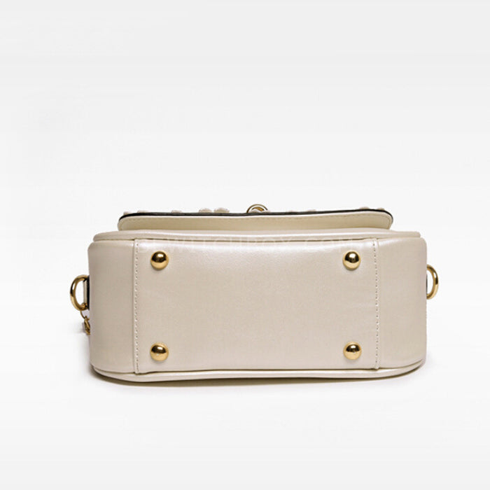 Flap shoulder bag with plum flower ornaments